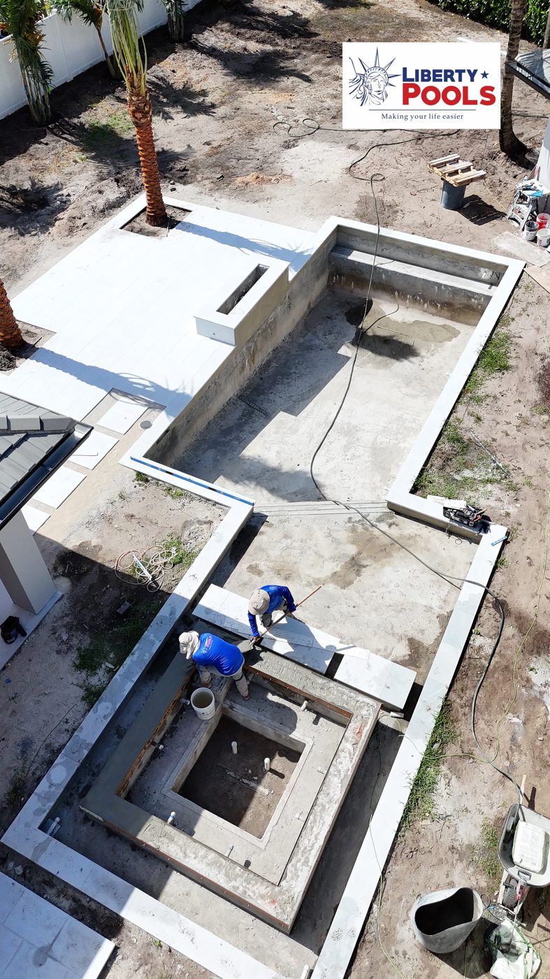 Finished shotcrete shell of the pool and raised spa